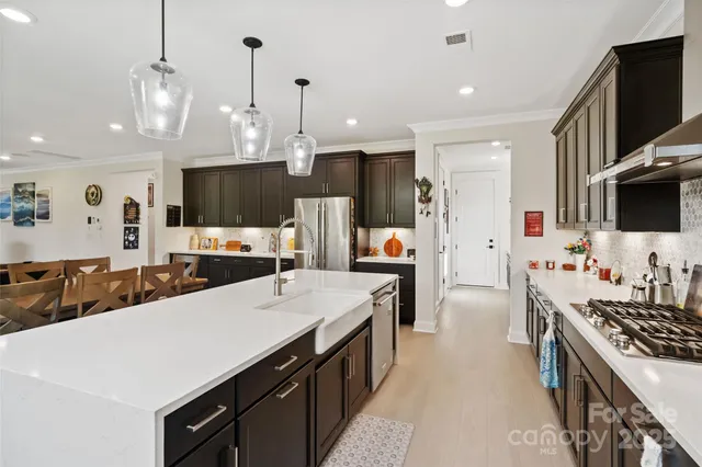 a bathroom with a double vanity sink and mirror