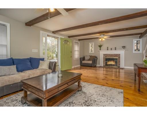 98 Cap'n Lijah's Road Barnstable, MA 02632 - Photo 5 of 9 a living room with furniture and a fireplace