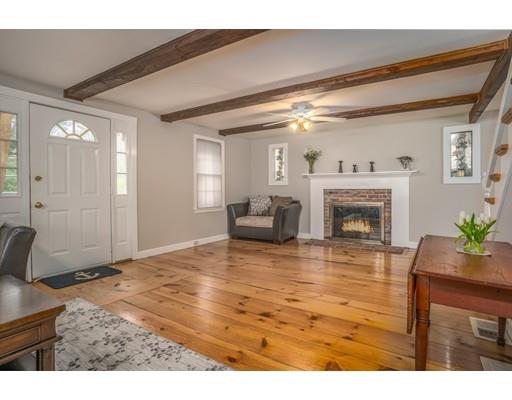98 Cap'n Lijah's Road Barnstable, MA 02632 - Photo 6 of 9 a view of living room with furniture and a fireplace