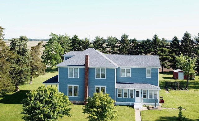 1780 Higgins Road Morris, IL 60450 - Photo 1 of 30 a aerial view of a residential apartment building with a yard