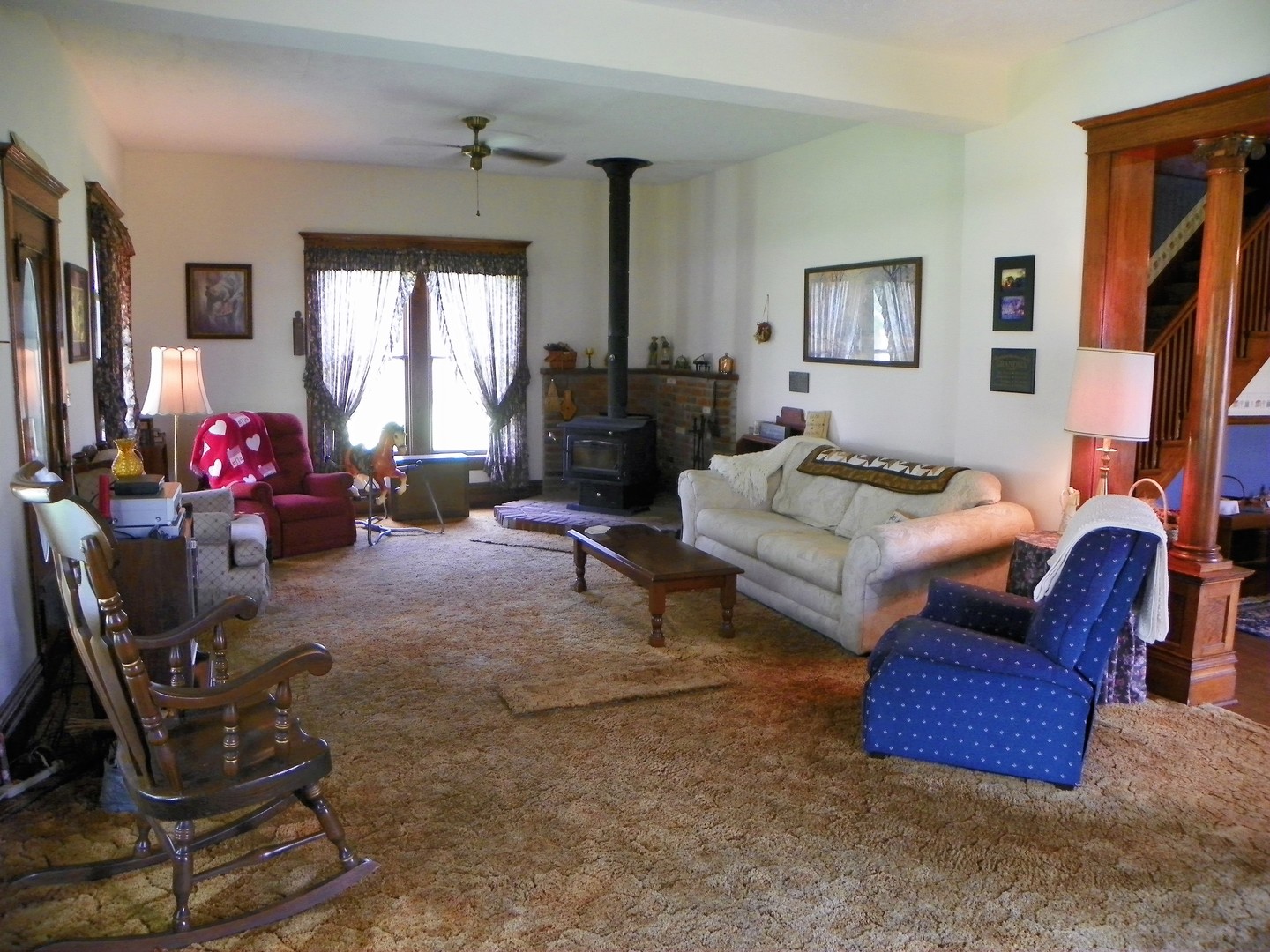 1780 Higgins Road Morris, IL 60450 - Photo 6 of 30 a living room with furniture a window and a flat screen tv