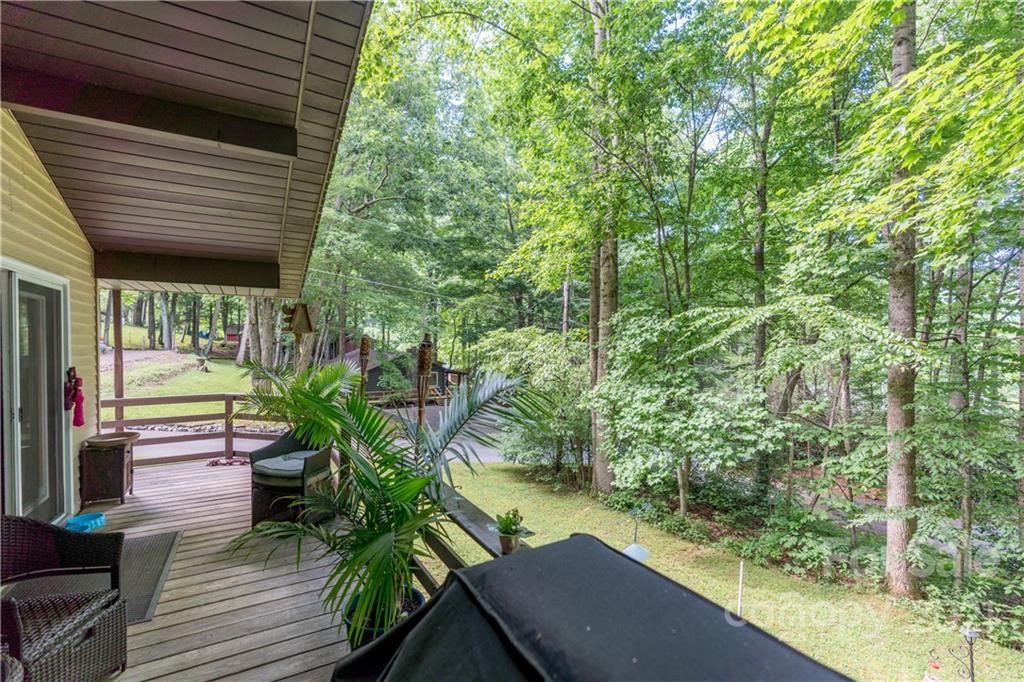 165 Nottingham Road Maggie Valley, NC 28751 - Photo 17 of 29 a view of a house with backyard from deck