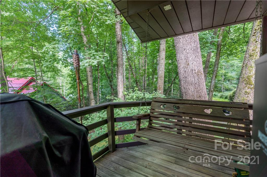 165 Nottingham Road Maggie Valley, NC 28751 - Photo 19 of 29 a view of a two chairs in the balcony