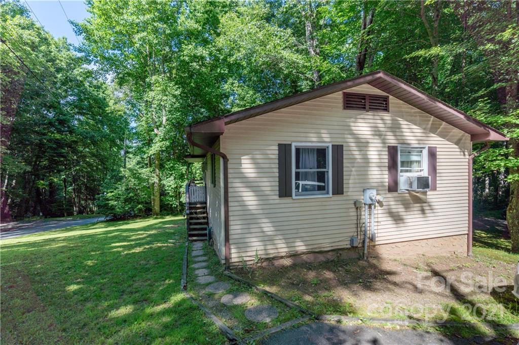 165 Nottingham Road Maggie Valley, NC 28751 - Photo 27 of 29 a front view of a house with a yard