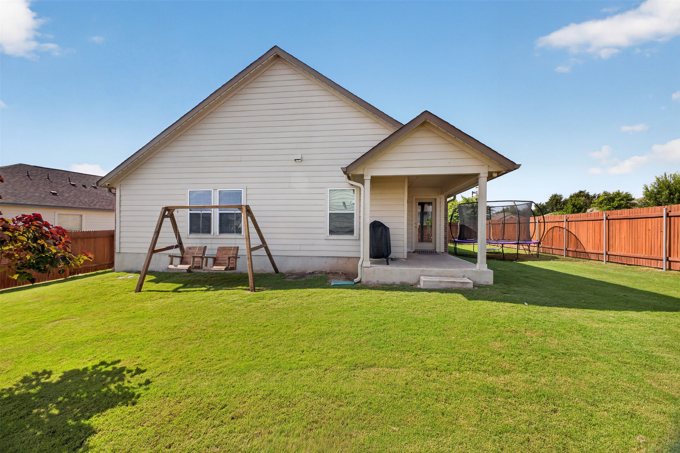 1009 Bright Star Cove Georgetown, TX 78628 - Photo 28 of 40 a view of a house with a yard and porch