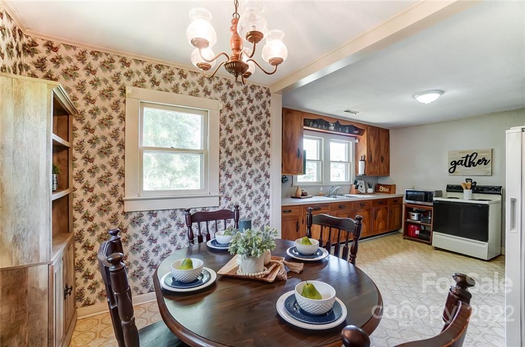 715 Clontz Long Road Monroe, NC 28110 - Photo 19 of 34 a dining room with furniture and window