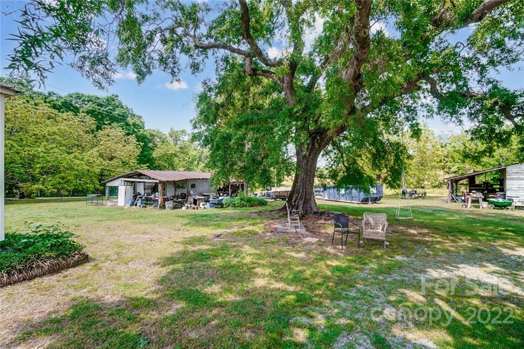 715 Clontz Long Road Monroe, NC 28110 - Photo 28 of 34 a view of a house with a yard