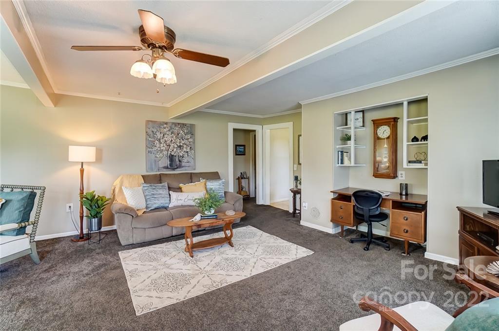 715 Clontz Long Road Monroe, NC 28110 - Photo 6 of 34 a living room with furniture lamp and rug