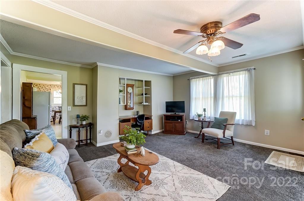 715 Clontz Long Road Monroe, NC 28110 - Photo 7 of 34 a living room with furniture and wooden floor