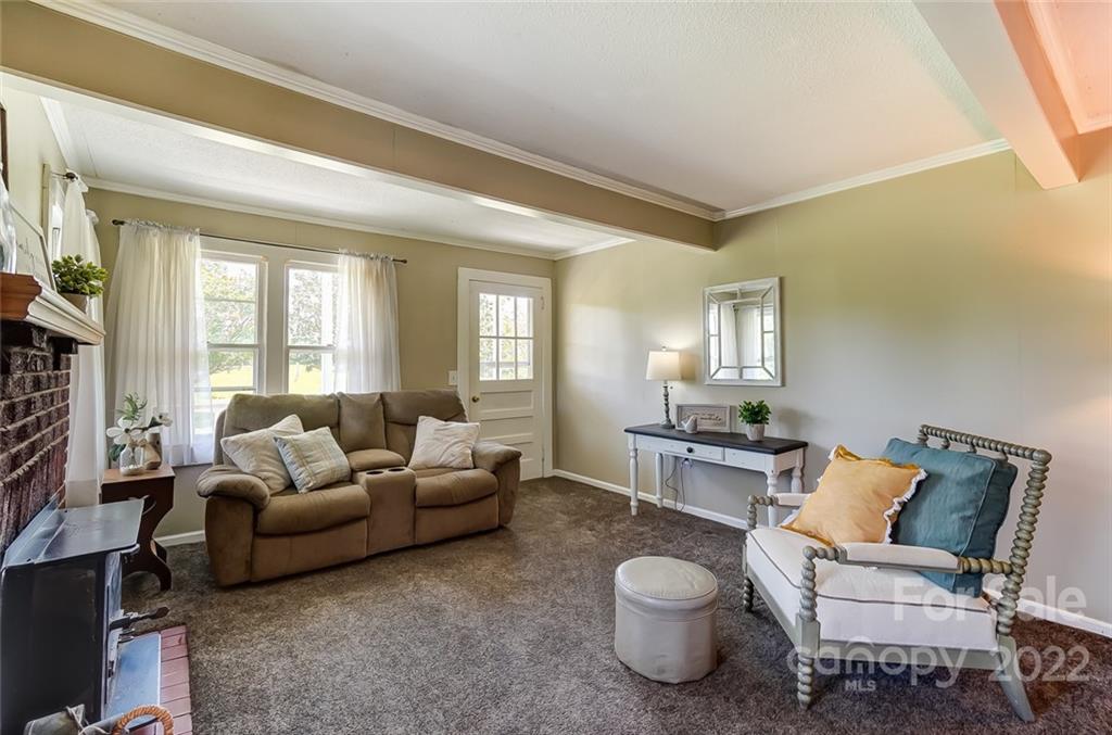 715 Clontz Long Road Monroe, NC 28110 - Photo 10 of 34 a living room with furniture and a large window