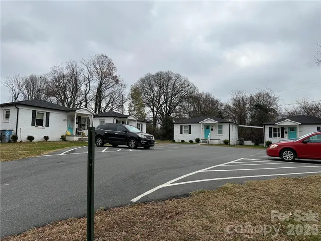 a view of street with parked cars