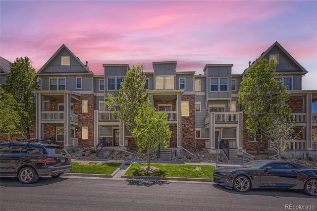 a car parked in front of a house