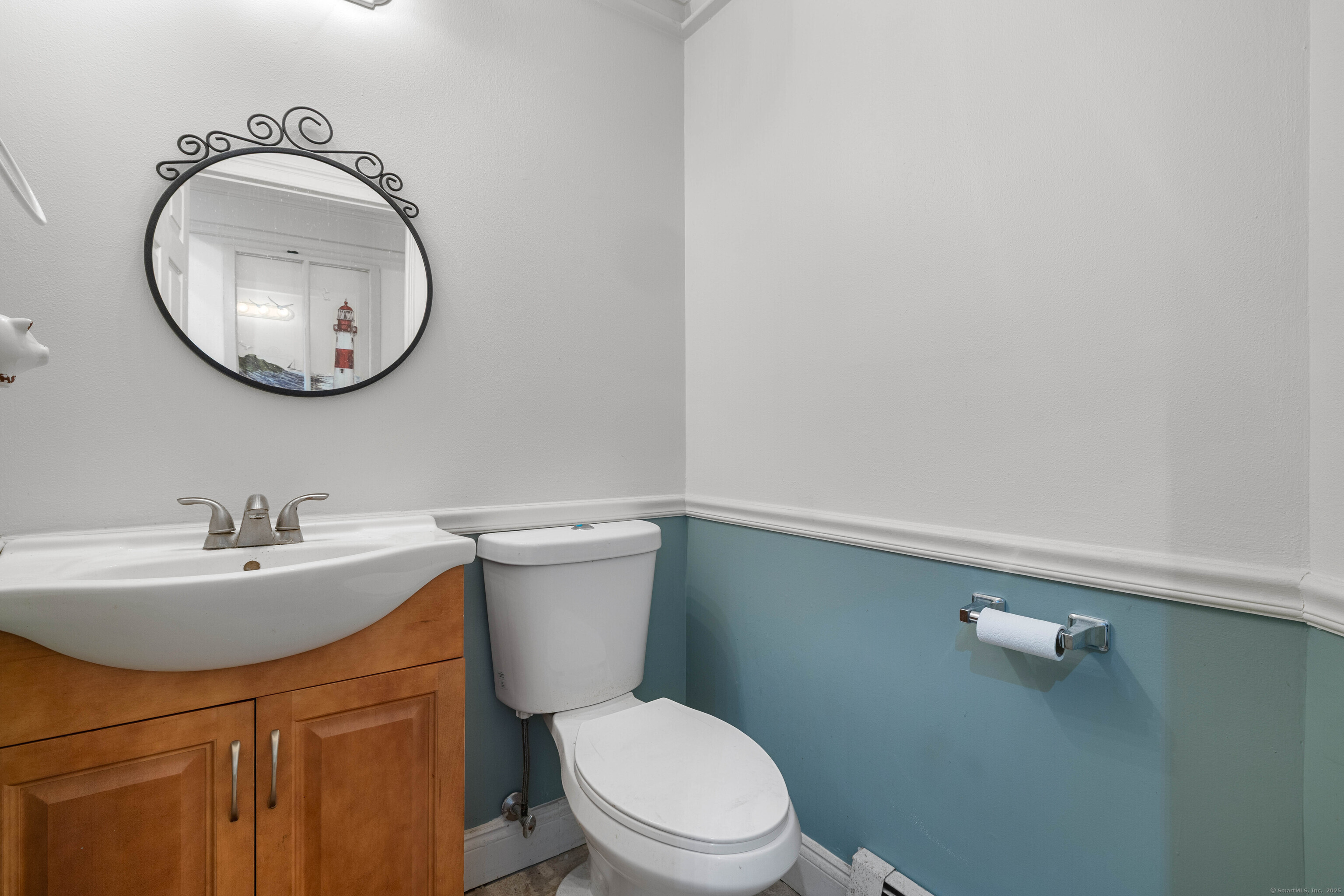 80 Sashel Lane Colchester, CT 06415 - Photo 22 of 37 First floor half bath - this is right before the laundry room
