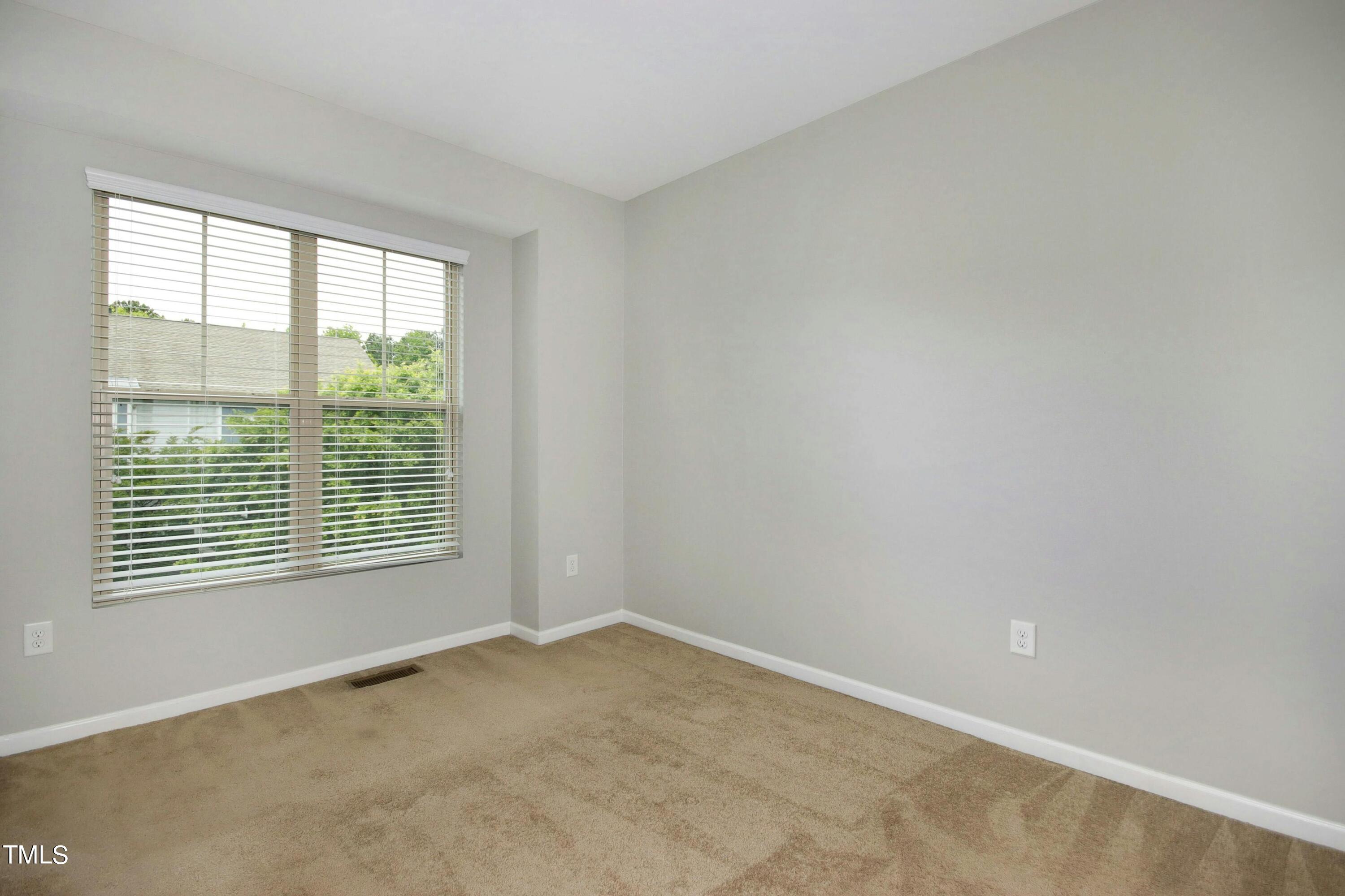 1418 Ardara Lane Raleigh, NC 27607 - Photo 23 of 34 a view of an empty room with a window