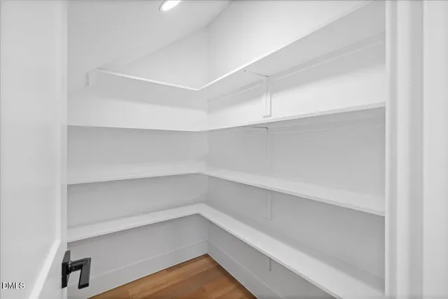 a view of an empty walk in closet