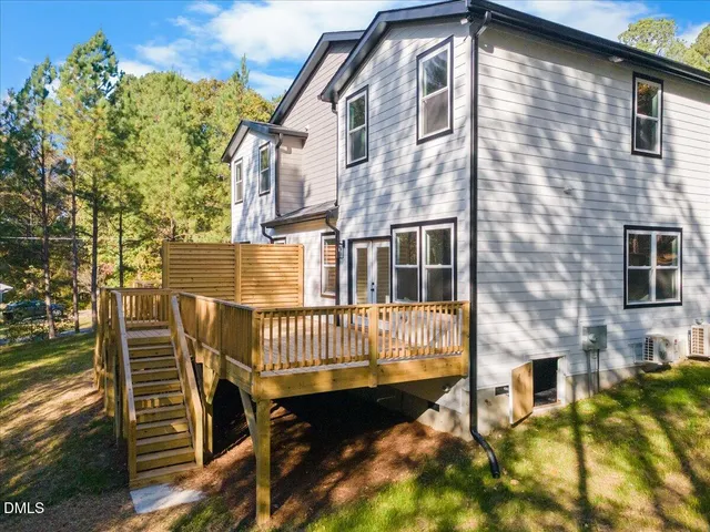 a view of a chair and table in the patio