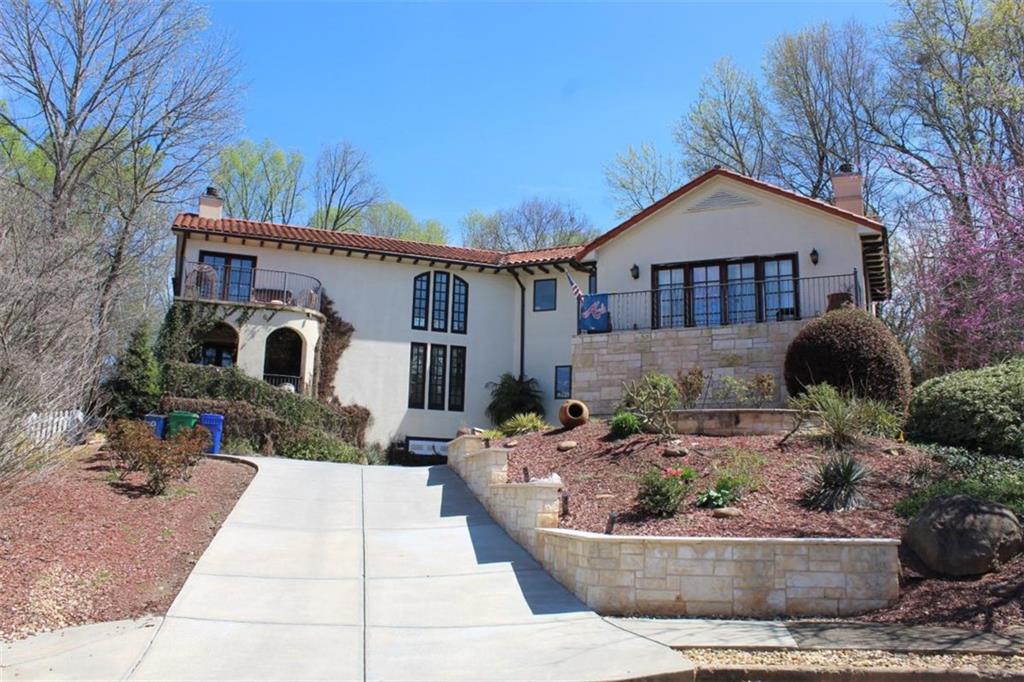 a front view of a house with entertaining space
