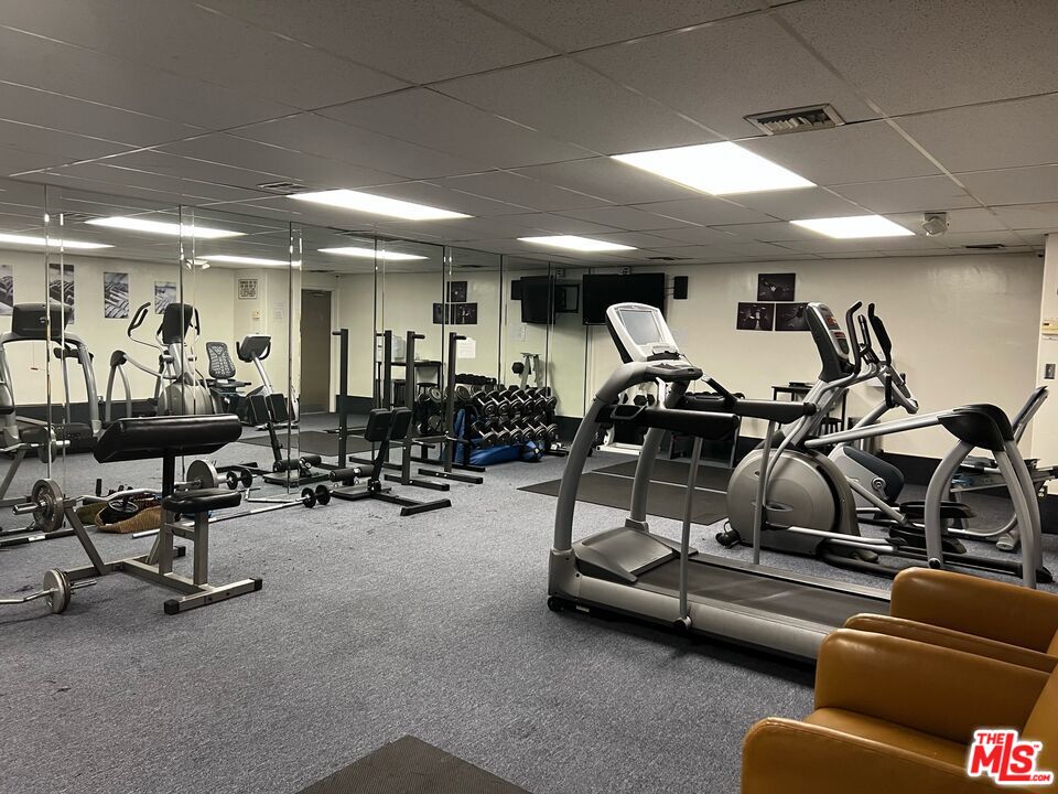 1250 North Kings Road, Unit 506 West Hollywood, CA 90069 - Photo 18 of 22 a view of a room with gym equipment