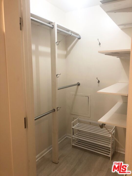 1250 North Kings Road, Unit 506 West Hollywood, CA 90069 - Photo 7 of 22 a bathroom with a shower and a sink