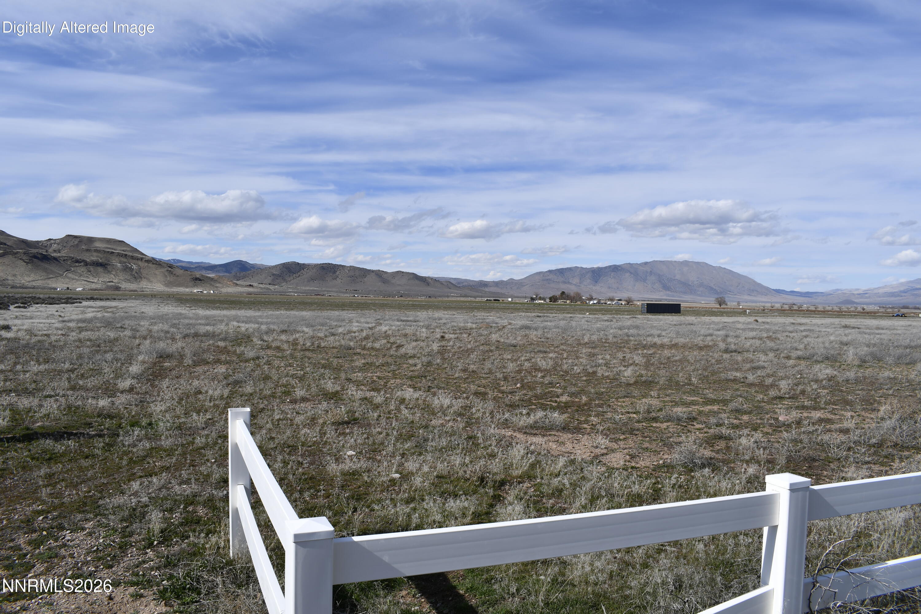 300 Honalo Court Reno, NV 89510 - Photo 16 of 18 a view of a lake from a yard