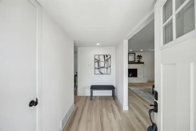 a view of kitchen with cabinets