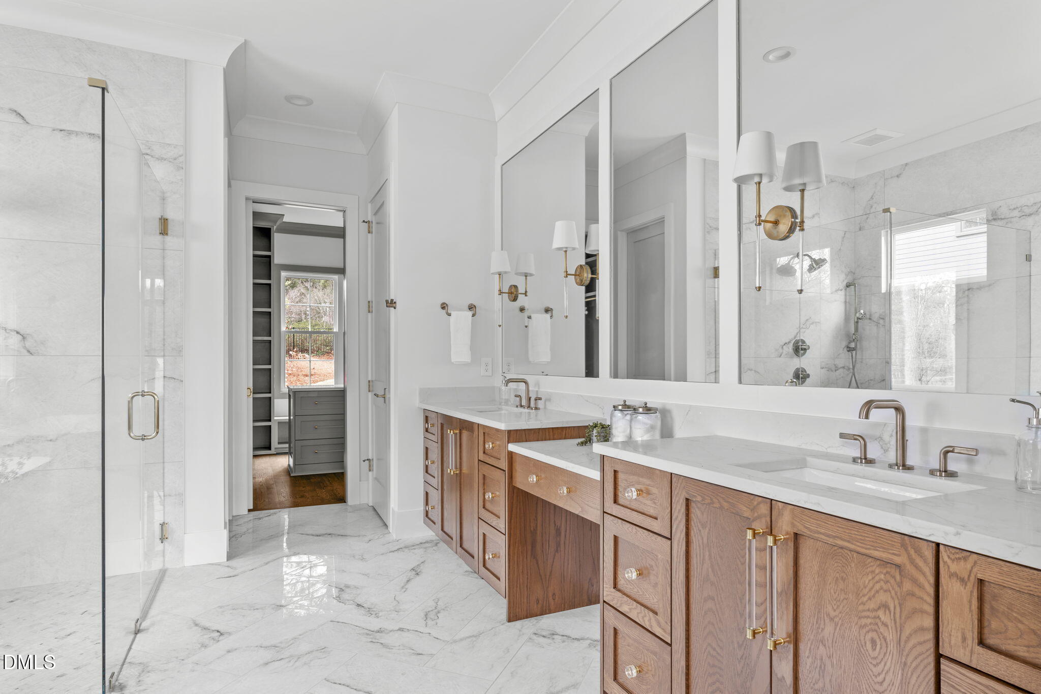 806 Tyrrell Road Raleigh, NC 27609 - Photo 14 of 38 a spacious bathroom with a sink and a mirror
