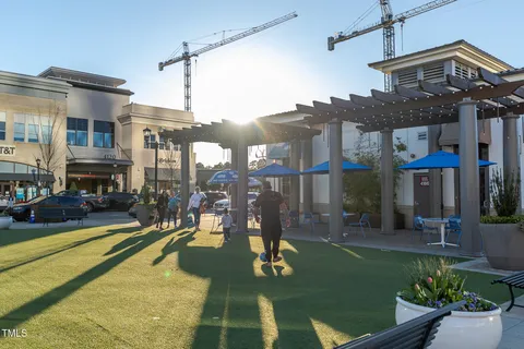 a front view of a building with parking