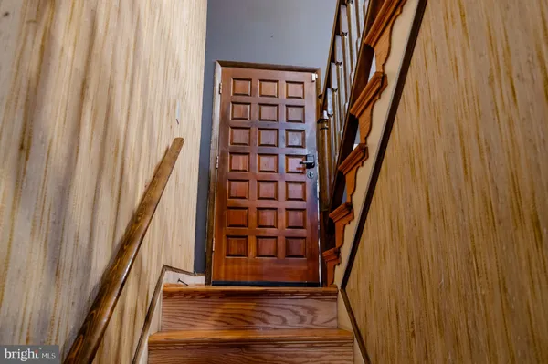 a view of front door with stairs