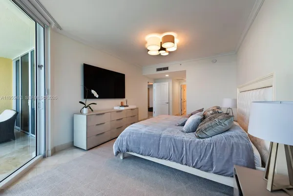 a kitchen with a cabinets and chairs