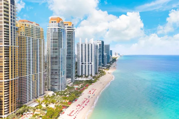 a view of a city with tall buildings