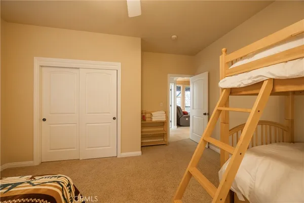 a view of a livingroom with furniture and stairs