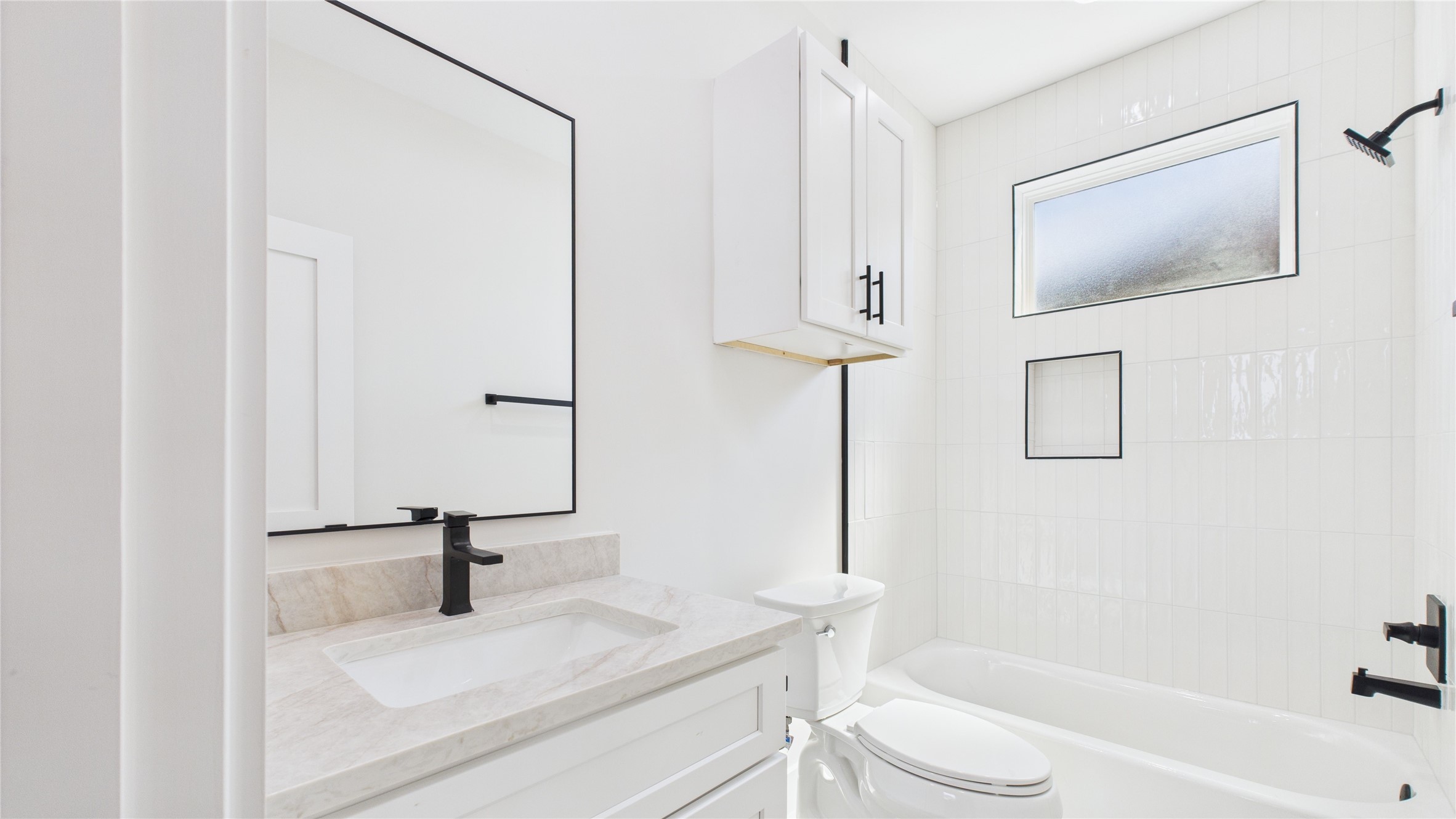 4506 Robertson Street Houston, TX 77009 - Photo 16 of 25 a bathroom with a granite countertop sink toilet and shower