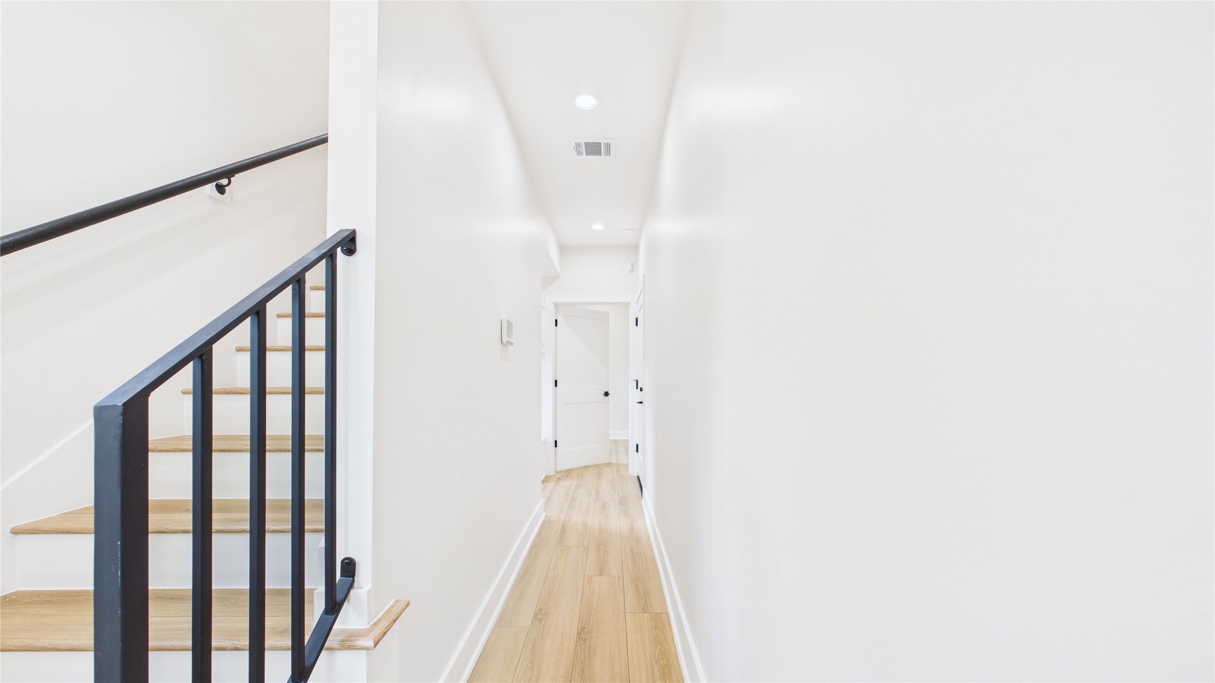 4506 Robertson Street Houston, TX 77009 - Photo 2 of 25 a view of hallway with stairs