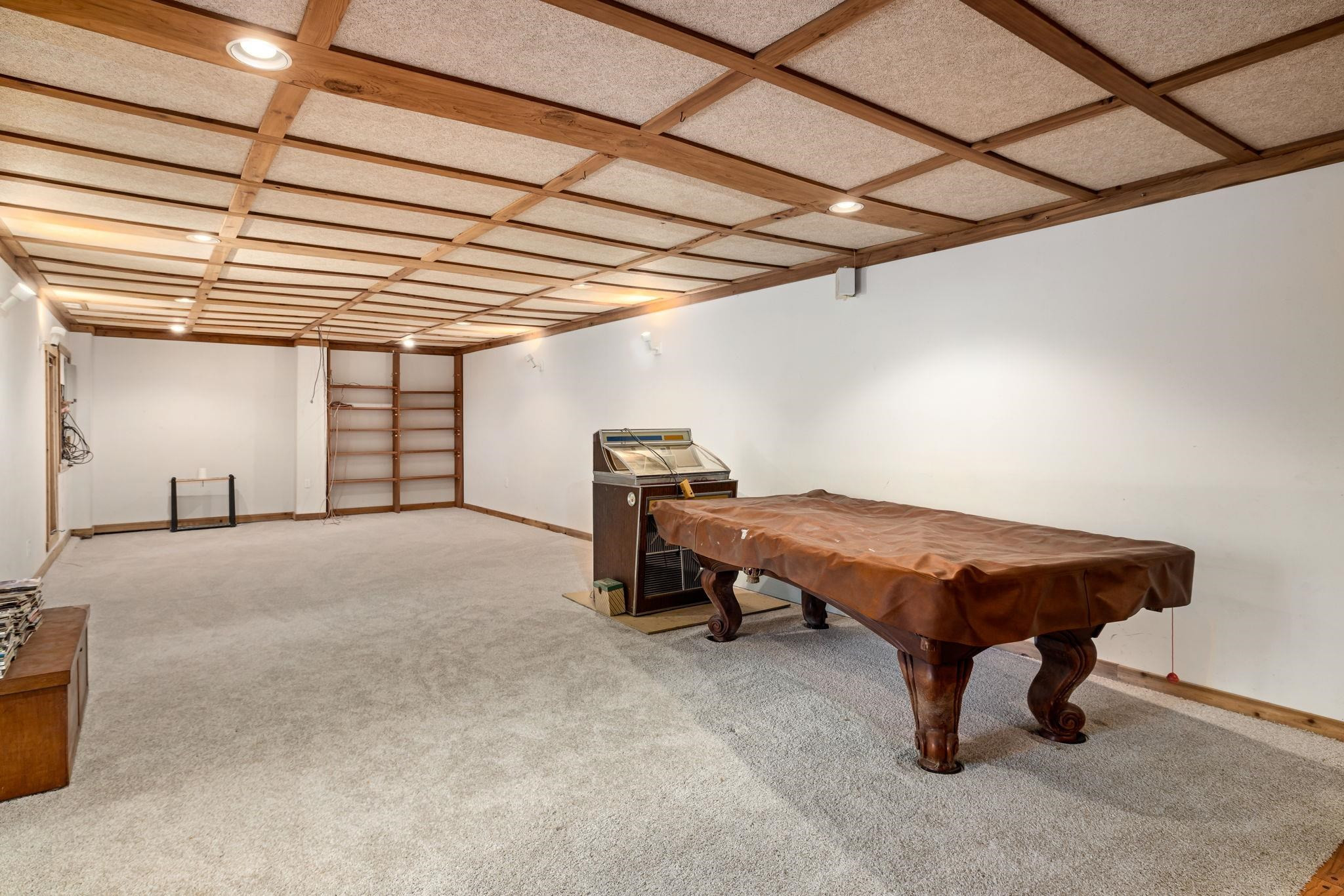 8028 Mourning Dove Road Raleigh, NC 27615 - Photo 26 of 35 a bedroom with a bed and a chandelier
