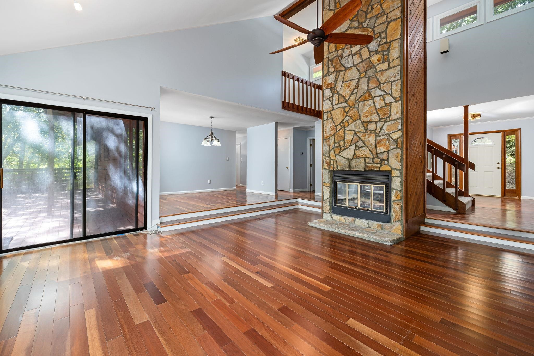 8028 Mourning Dove Road Raleigh, NC 27615 - Photo 6 of 35 a view of an entryway with wooden floor and door