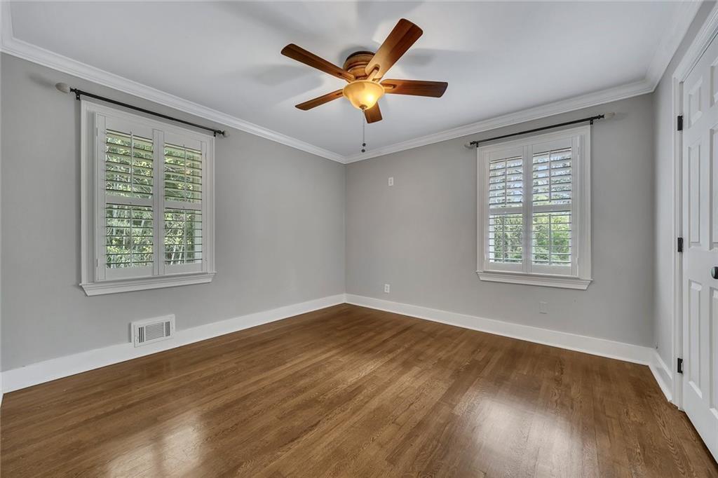 2290 Beaver Creek Road Smyrna, GA 30080 - Photo 22 of 66 a view of an empty room with wooden floor and a window