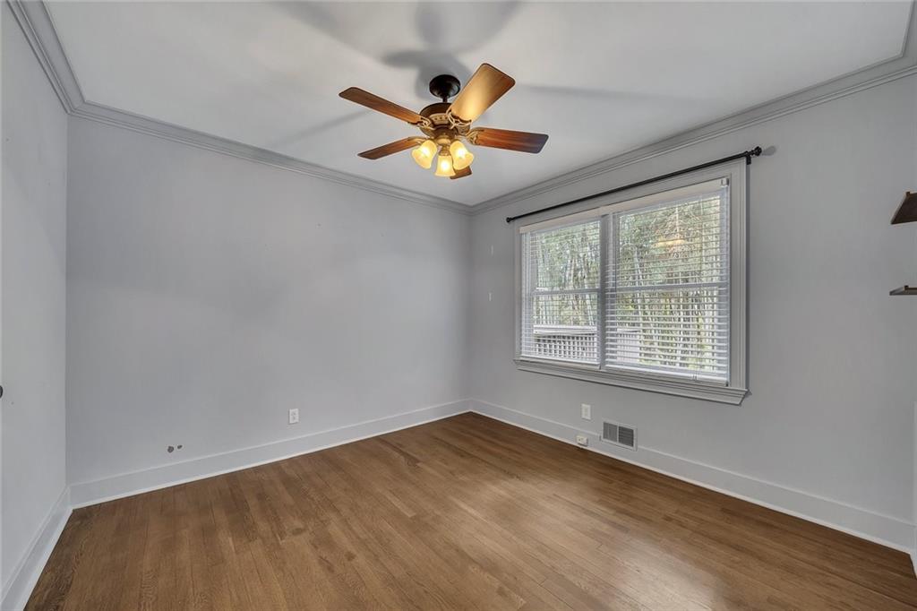 2290 Beaver Creek Road Smyrna, GA 30080 - Photo 26 of 66 a view of an empty room with chandelier fan and a window