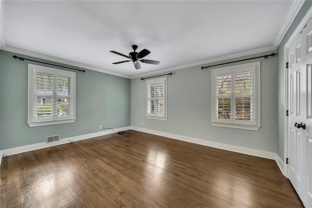 2290 Beaver Creek Road Smyrna, GA 30080 - Photo 28 of 66 a view of an empty room with a window and wooden floor