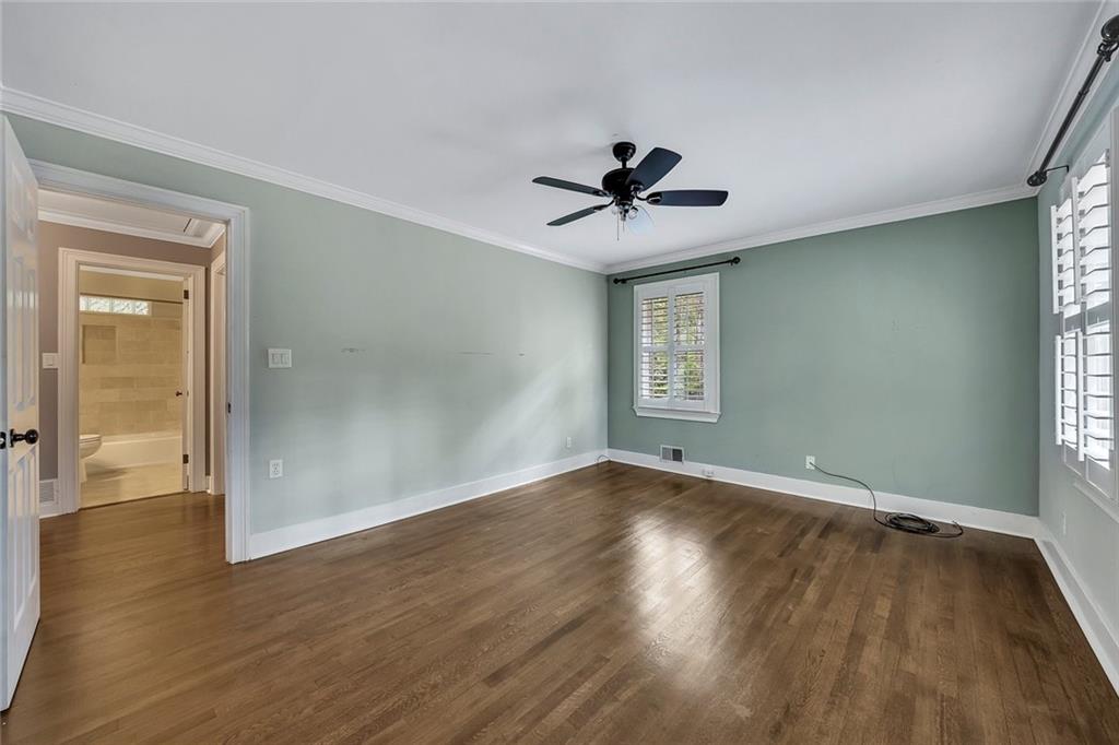 2290 Beaver Creek Road Smyrna, GA 30080 - Photo 29 of 66 a view of empty room with wooden floor and fan
