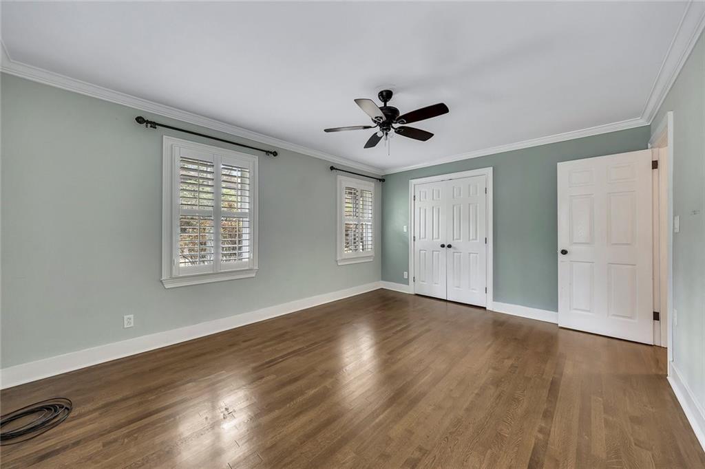 2290 Beaver Creek Road Smyrna, GA 30080 - Photo 31 of 66 a view of an empty room with wooden floor and a window