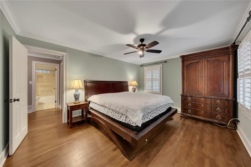 2290 Beaver Creek Road Smyrna, GA 30080 - Photo 36 of 66 a bedroom with a bed and a chandelier