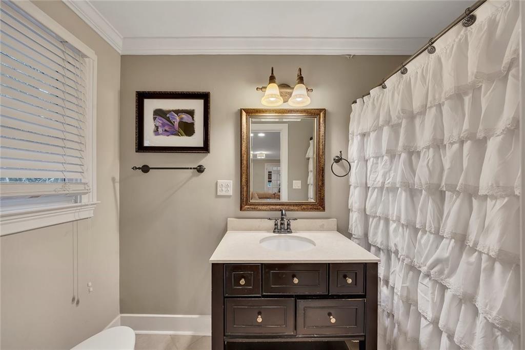 2290 Beaver Creek Road Smyrna, GA 30080 - Photo 42 of 66 a bathroom with a sink and a mirror