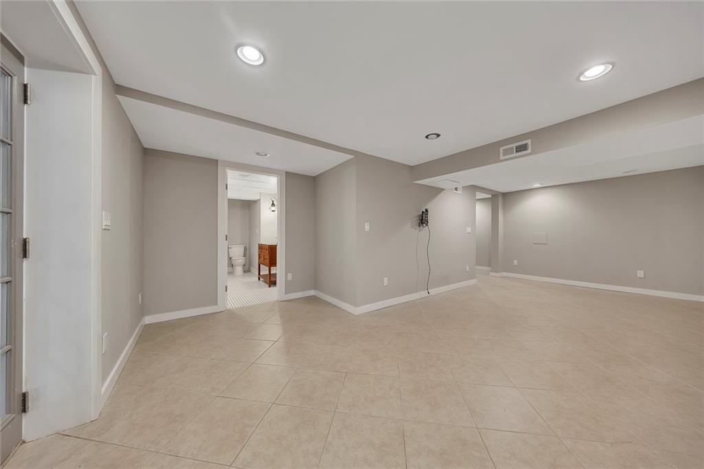 2290 Beaver Creek Road Smyrna, GA 30080 - Photo 46 of 66 an empty room with windows and entrance