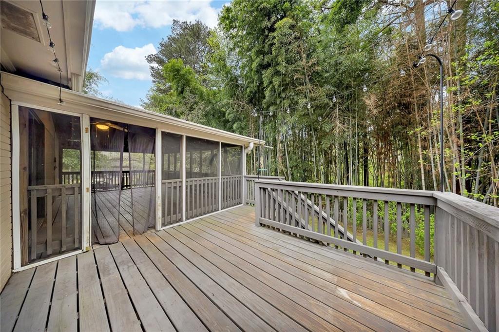 2290 Beaver Creek Road Smyrna, GA 30080 - Photo 54 of 66 a balcony with wooden floor and fence