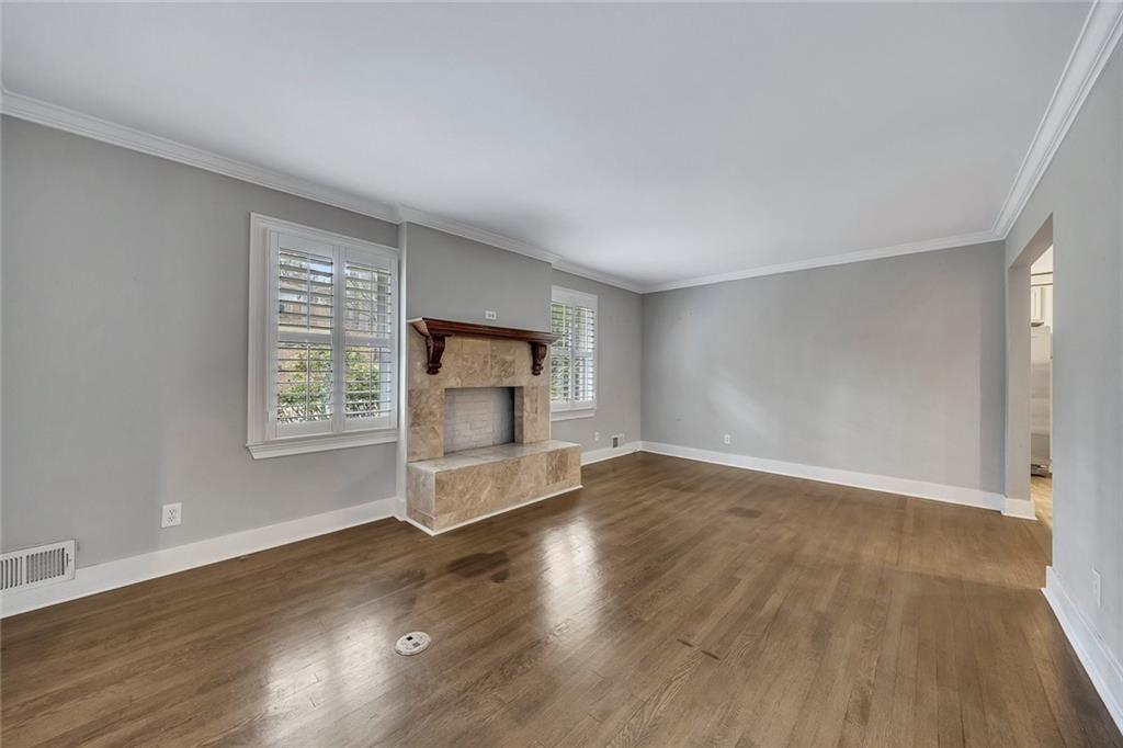 2290 Beaver Creek Road Smyrna, GA 30080 - Photo 7 of 66 a view of empty room with wooden floor and fan