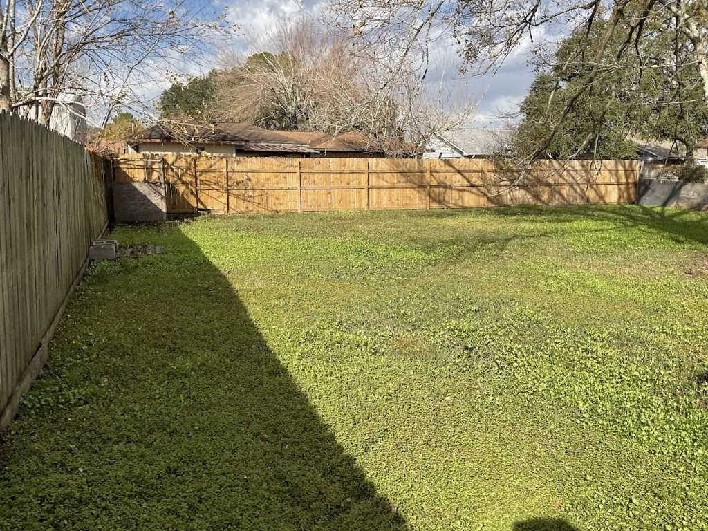 117 Bastrop Street Angleton, TX 77515 - Photo 15 of 15 a view of swimming pool with an outdoor space