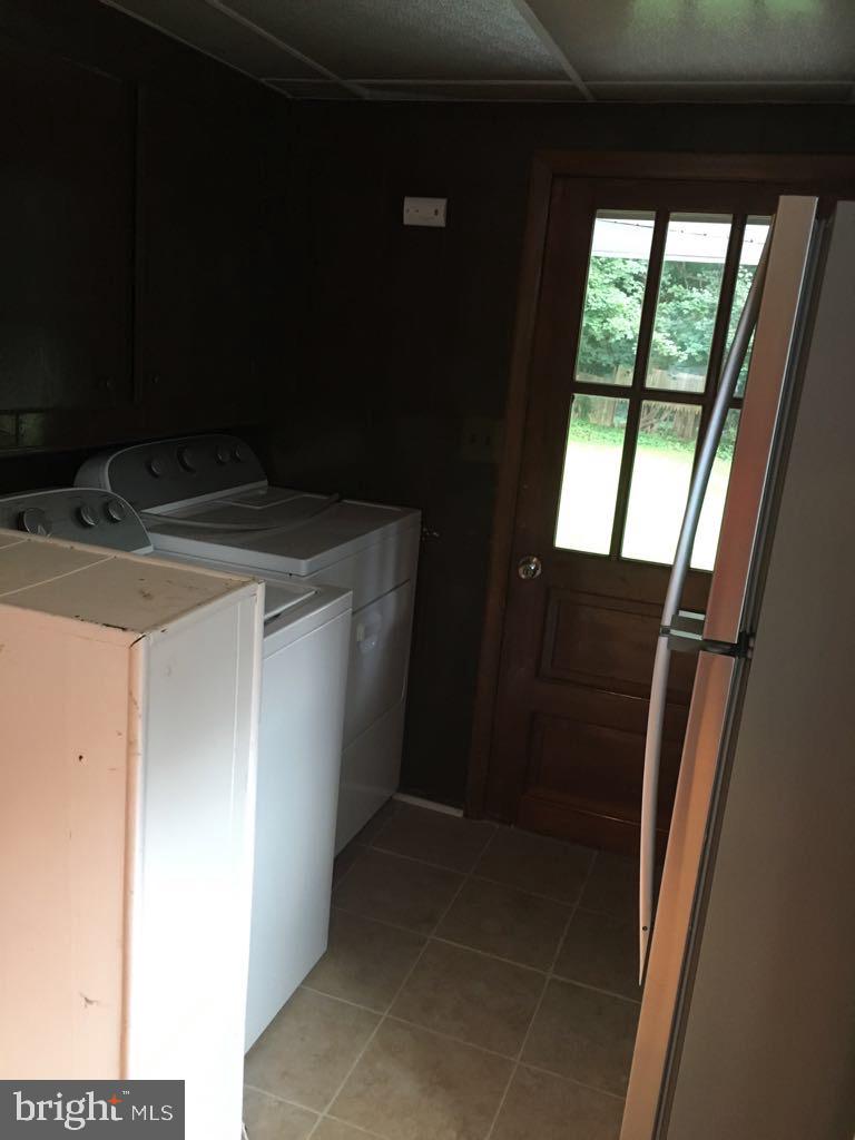 130 Conestoga Road Devon, PA 19333 - Photo 11 of 11 a utility room with dryer and washer