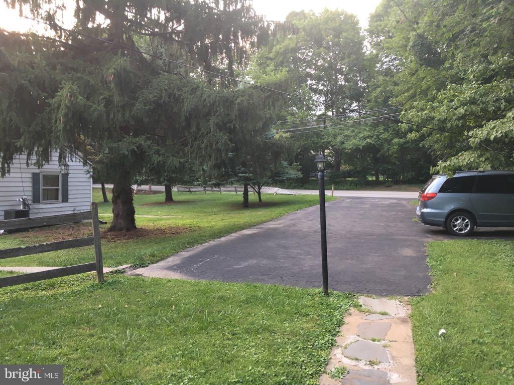 130 Conestoga Road Devon, PA 19333 - Photo 5 of 11 a view of a park with large trees