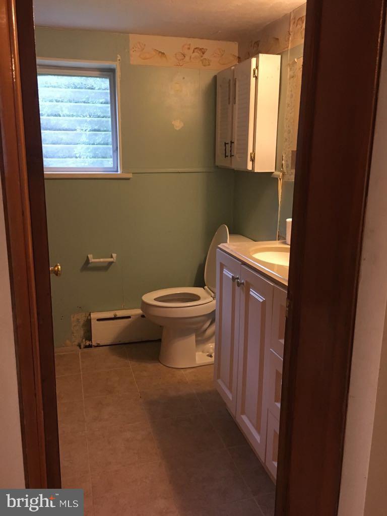 130 Conestoga Road Devon, PA 19333 - Photo 6 of 11 a bathroom with a toilet and a sink