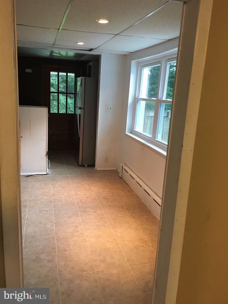 130 Conestoga Road Devon, PA 19333 - Photo 10 of 11 an empty room with windows